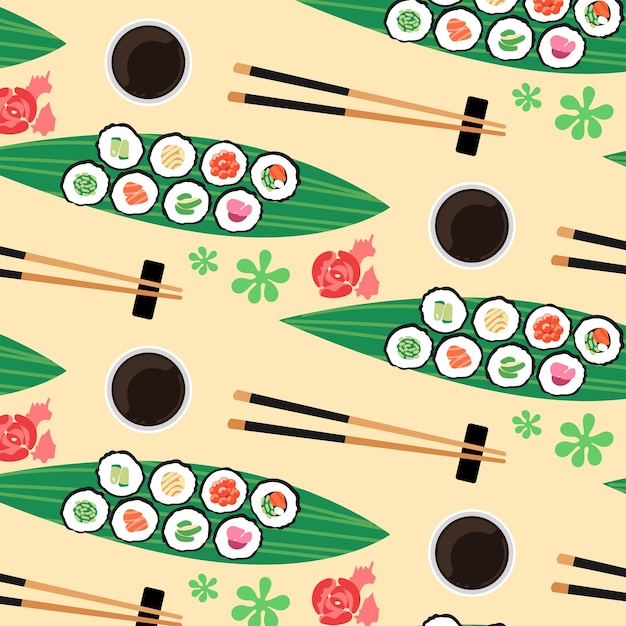 Pattern with maki rolls on a leaf soy sauce chopsticks ginger and wasabi View from above