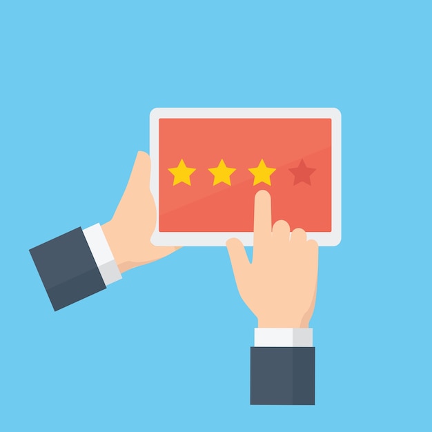 People hand giving star rating on a tablet