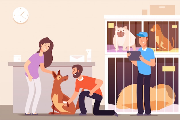 People in shelter with cats and dogs in cages