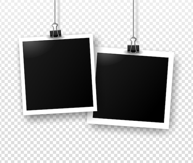 Photo frames hanging on binder clips with shadow. Template for editing. Vector realistic illustration of empty photo isolated on transparent gray background.