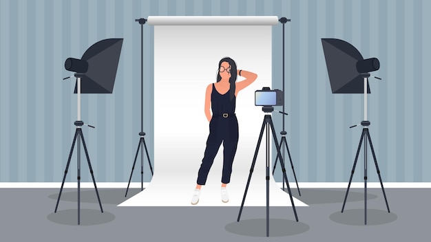 Photo Studio. Girl posing to the camera.