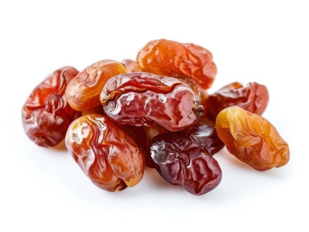 a pile of dried dates with a red shell