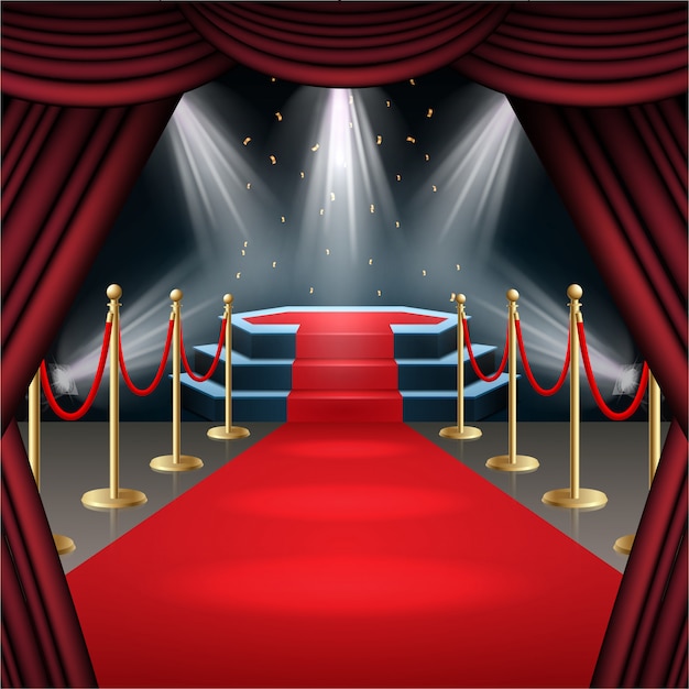 Podium with red carpet and curtain in glow of spotlights