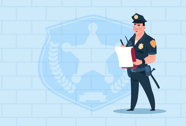 Policeman Writing Report Wearing Uniform Cop Guard Over Brick Background