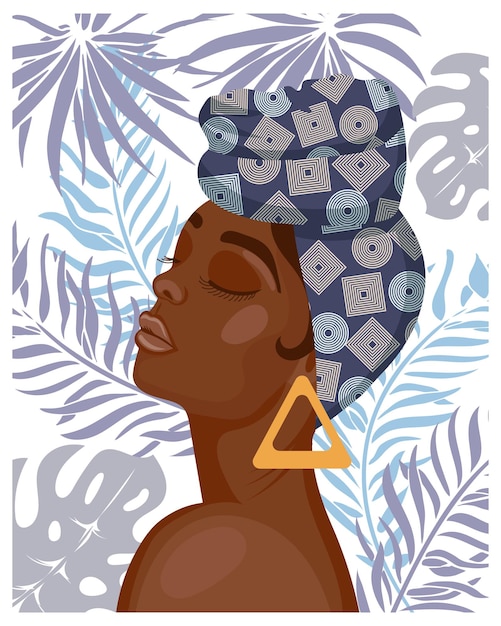 Portrait of a beautiful African woman in a national headdress on a background of tropical leaves.