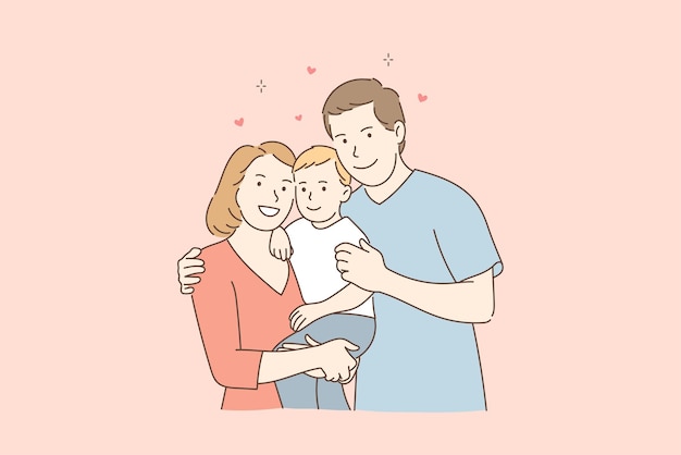 Portrait of the happy family with little child looking at camera