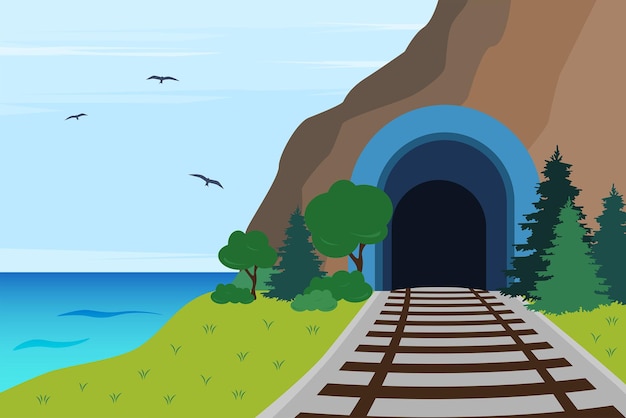 Railway tunnel in rock on the seaside surrounded by trees