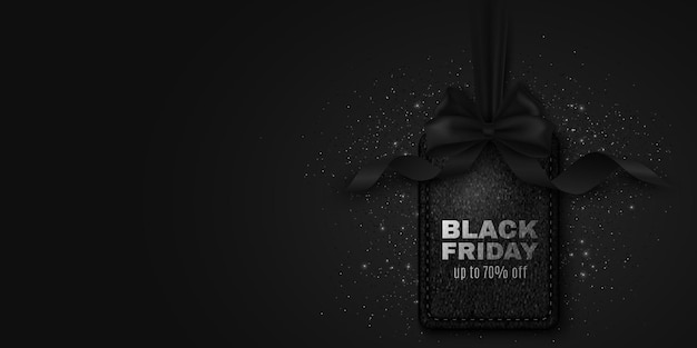 Realistic black leather label and silver glitters with bow for Black Friday sale Advertising tag for your business design Special offer and discount Sticker for advertisement Vector illustration