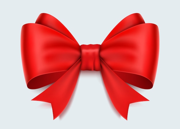 Realistic red bow isolated on white.