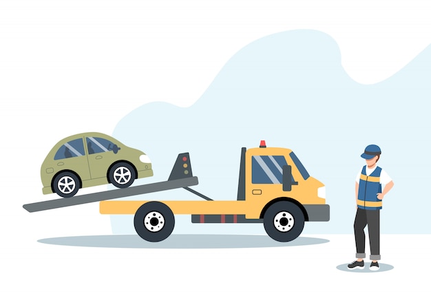 Roadside assistance and car insurance concept: broken car on a tow truck.