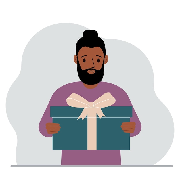 A sad man holds a large gift box with a bow in his hands Vector