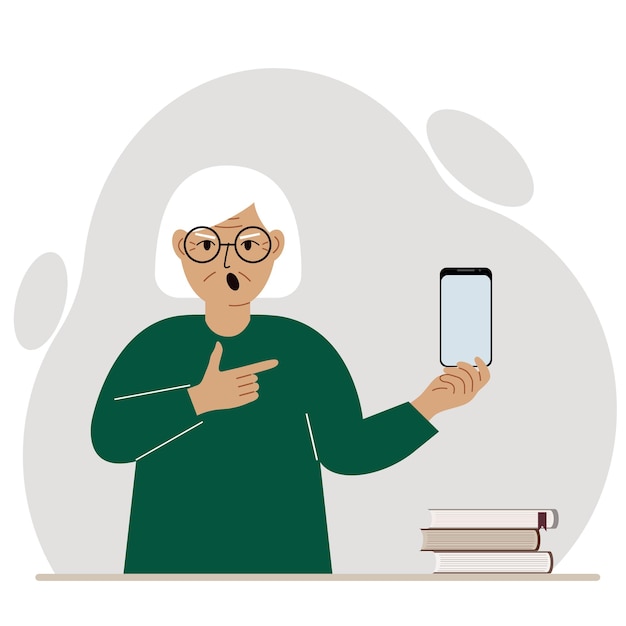 A screaming grandmother holds a mobile phone in one hand and points at it with the index finger of his other hand.