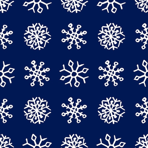 Seamless background of hand drawn snowflakes. White snowflakes on blue background. Christmas and New Year decoration elements. Vector illustration.