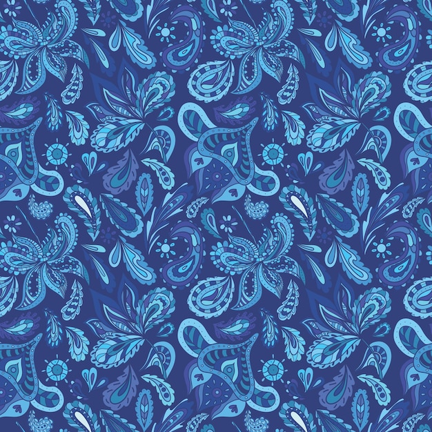 Seamless ethnic background in indigo shadows with eastern ornaments paisley feathers flowers in sketch doodle style for wallpaper and fabric textile design