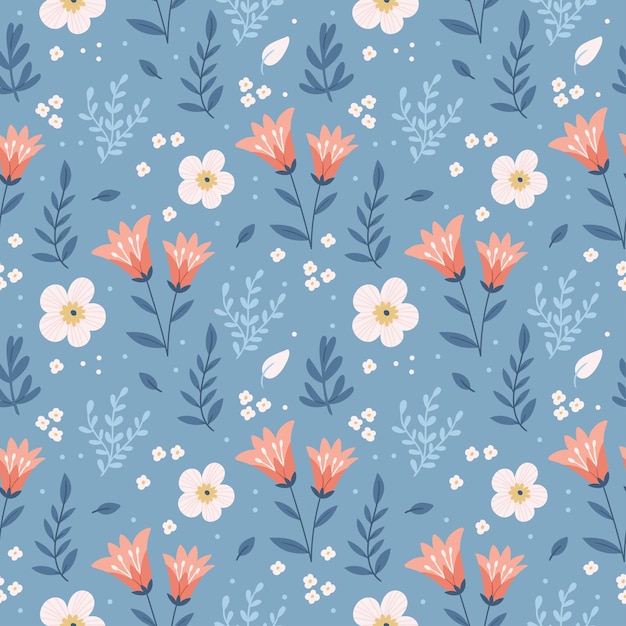 Seamless floral pattern with pink flowers and leaves on a blue background