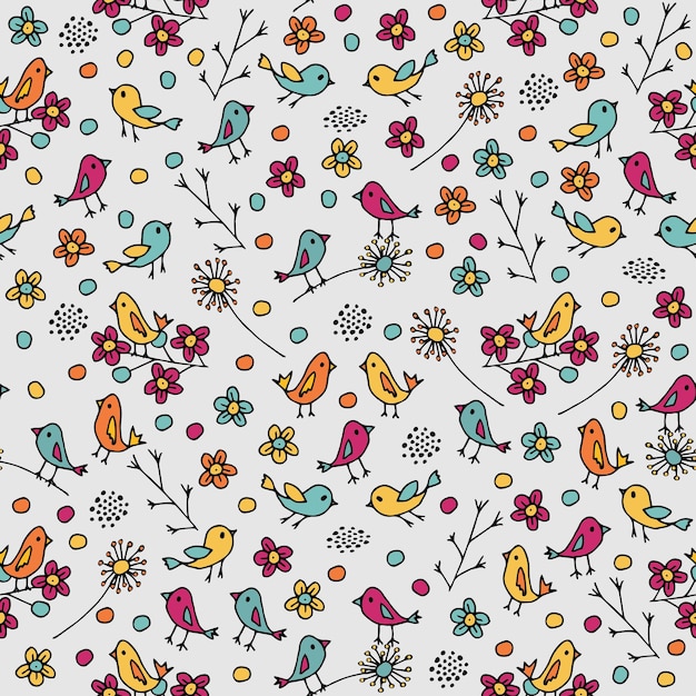 Seamless pattern with flowers and birds in a doodle style