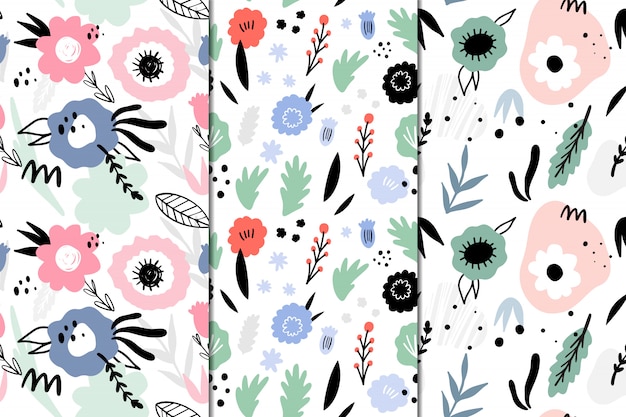 Set of 3 seamless patterns with abstract flowers. Hand drawn, Doodle style.