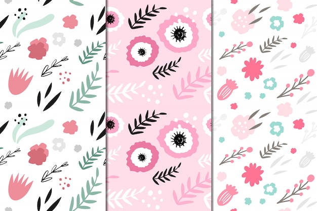 Set of 3 vector seamless patterns with abstract flowers. Hand drawn, Doodle style.