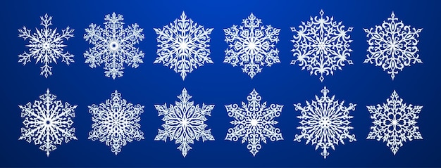 Set of beautiful complex Christmas snowflakes white on blue background