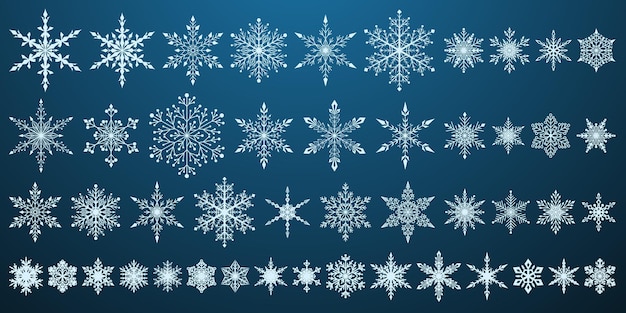 Set of beautiful complex Christmas snowflakes white on blue background