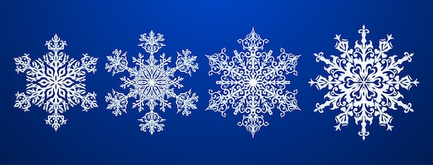 Set of beautiful complex Christmas snowflakes, white on blue background