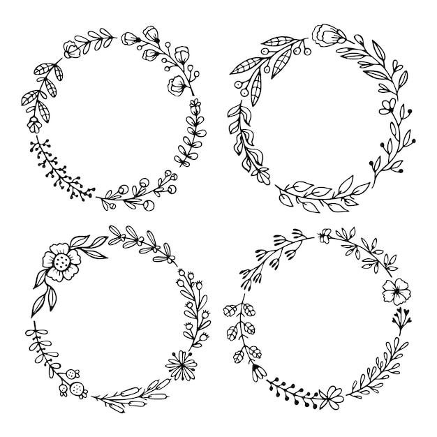 Set of black hand drawn wreaths isolated on white background