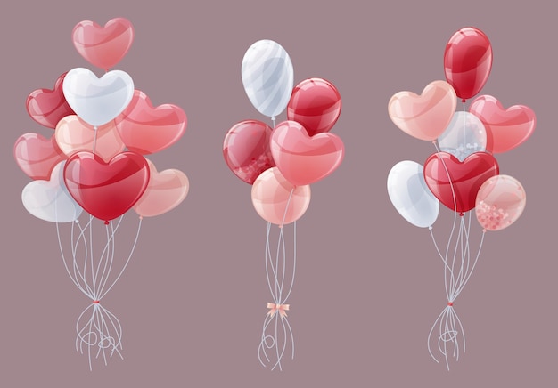 Set of bunches of red and pink balloons on an isolated background Heartshaped balloons for Valentines Day wedding holiday