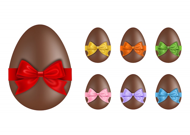 Set of chocolate eggs with colorful bows