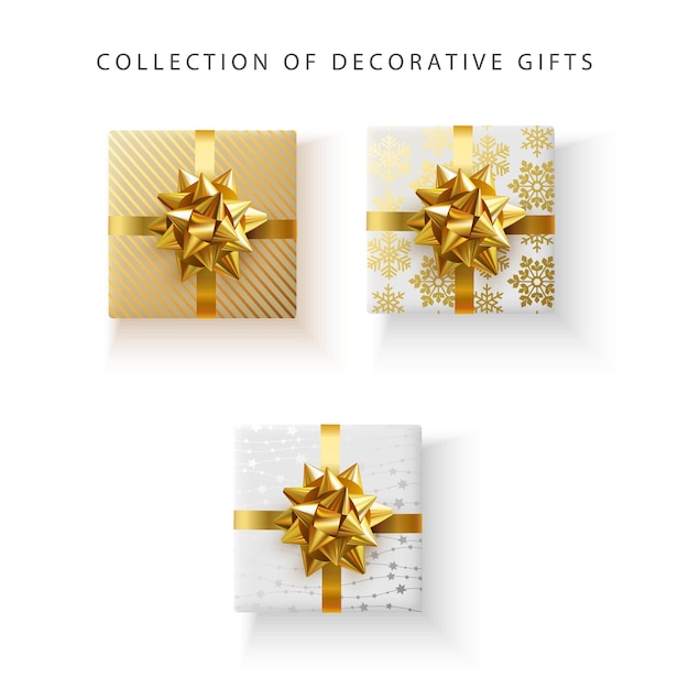 Set of decorative gift boxes with golden satin bow isolated on white background