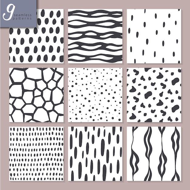 Set of nine hand drawn seamless abstract patterns in black and white colors