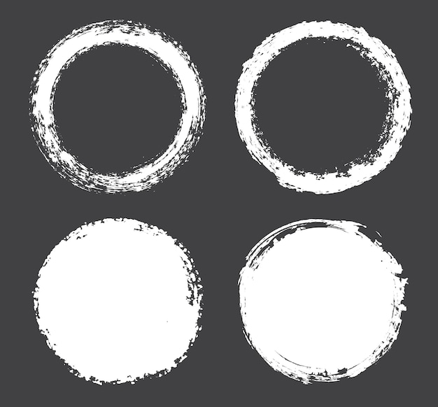 Set of white grungy round frames.