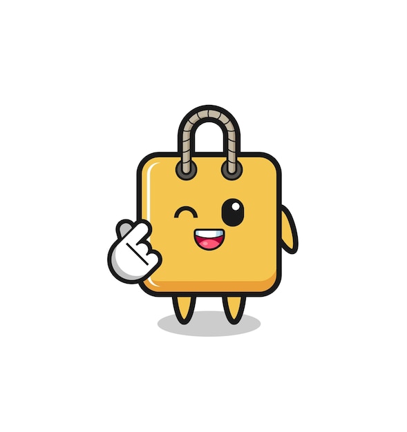 Shopping bag character doing Korean finger heart