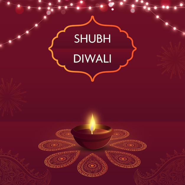 Shubh Happy Diwali Font In Vintage Frame With Illuminated Oil Lamp Diya And Lighting Garland On Red Paisley Pattern Background