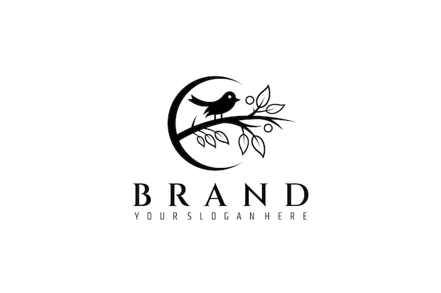 Silhouette bird logo perched on tree branch full of leaves with crescent moon frame