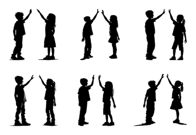 Silhouette of boy and girl high fiving friendship or brotherhood concept