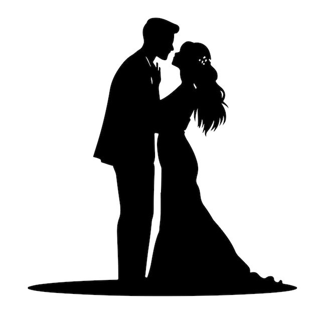 A silhouette of a bride and groom kissing