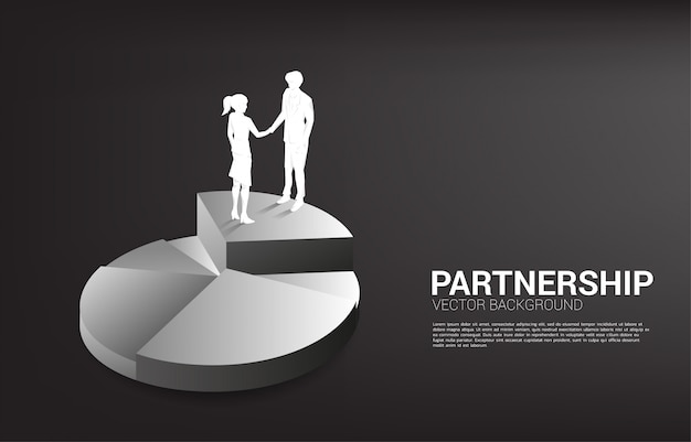 Silhouette of businessman and businesswoman handshake on pie chart. Concept of team work partnership and cooperation.