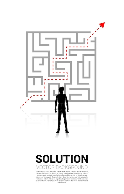 Silhouette of Businessman standing with plan to exit from maze . Business concept for problem solving and solution strategy