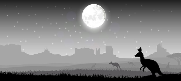 Silhouette of a deer standing on the time of night