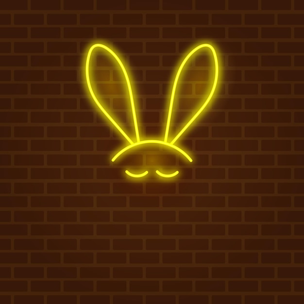 Silhouette of a hare with a neon effect on a brick wall background