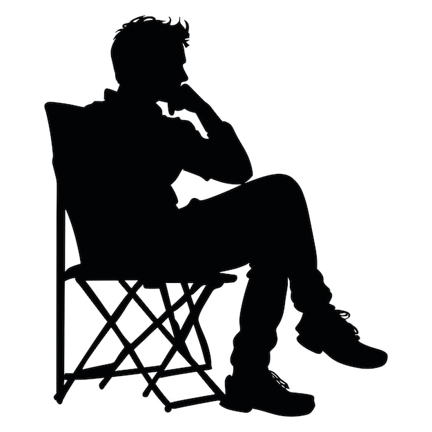 Silhouette of a man sitting on a chair thinking