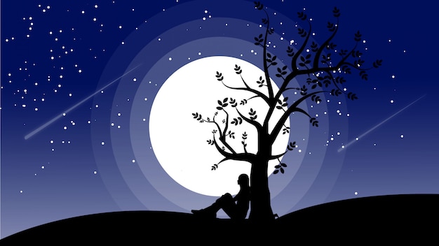 Silhouette of person lying under a tree with the moon behind