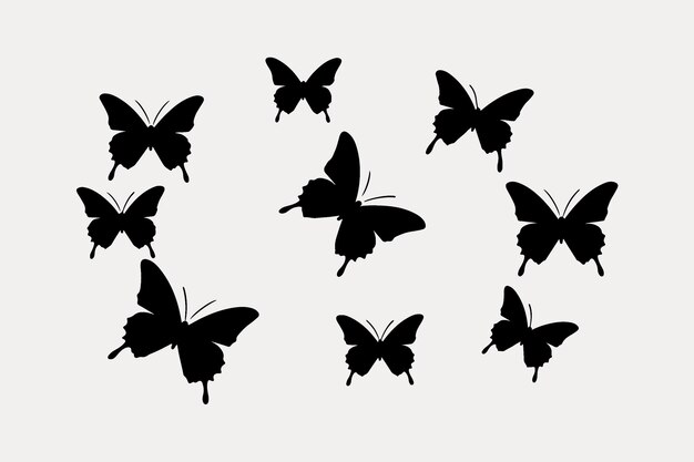 Silhouettes of butterflies flying