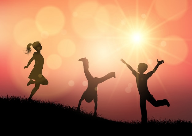 Vector silhouettes of children playing in sunset landscape