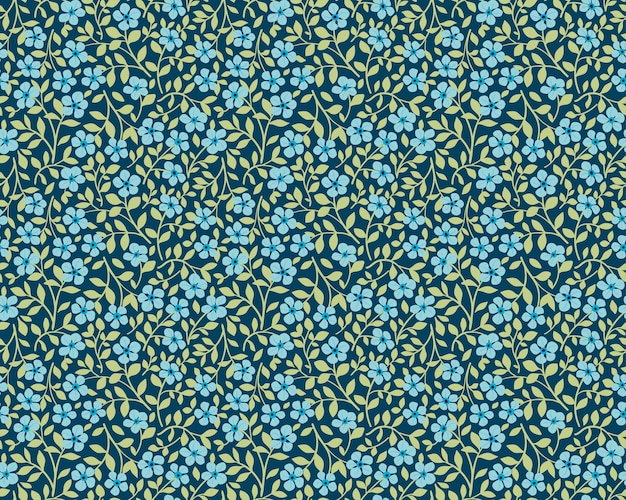 Simple cute pattern in small blue flowers on dark blue background. Liberty style. Ditsy print. Floral seamless background. The elegant the template for fashion prints.