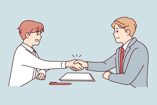 Smiling businessmen handshake closing deal