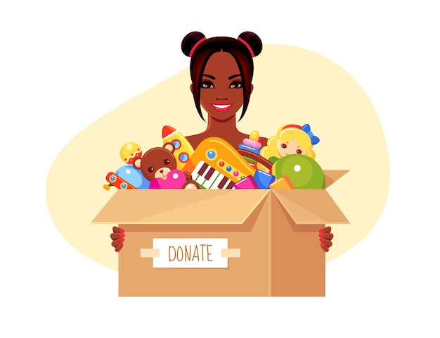 smiling girl holding donation paper box with children's toys