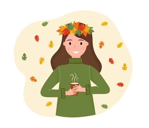 Smiling girl in wreath of autumn leaves with cup of hot drink in her hands Falling colorful leaves