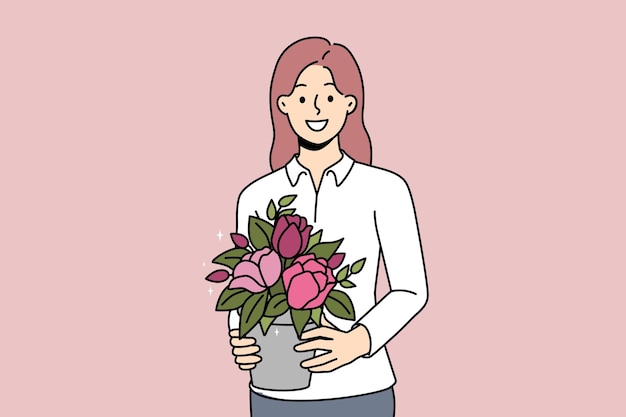 Smiling woman with blooming plant in hands