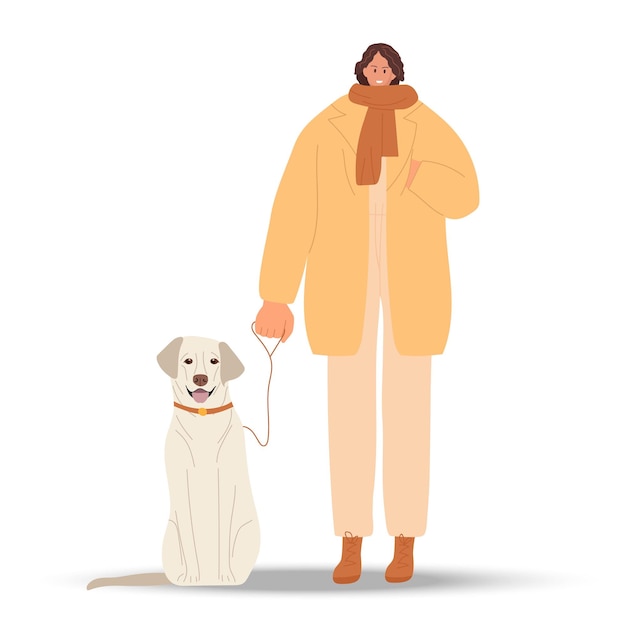 Smiling woman with dog. Girl wearing warm comfortable fashionable casual clothes and scarf walking